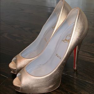 Gold glitter Louboutins